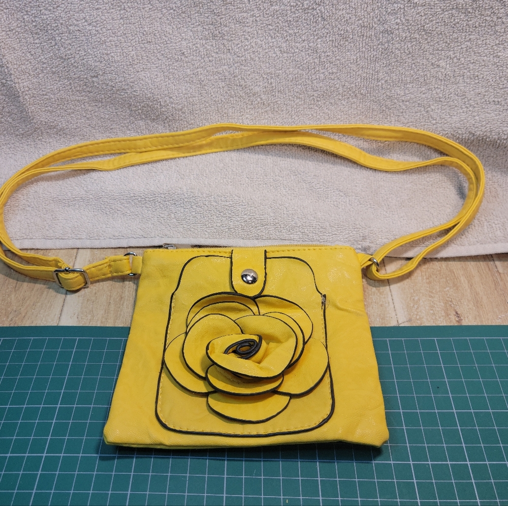 Rachel leather cross body floral  purse in amazing condition.